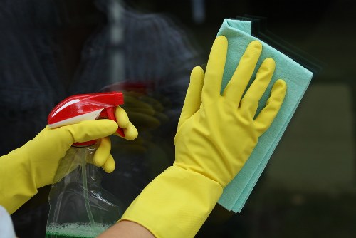 Cleaner working in a SE4 home with period property details