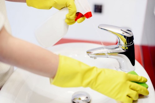 Technician explaining insurance-backed carpet cleaning service