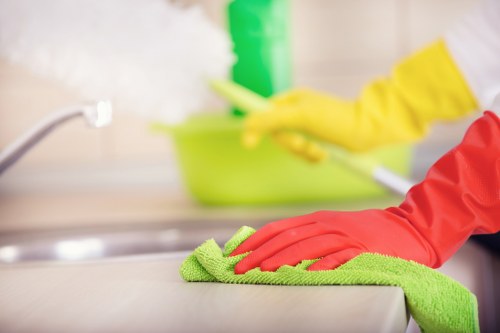 Local carpet cleaner preparing equipment for an SE4 apartment